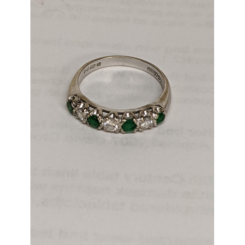 32 - A 18ct gold ring set with diamonds and emeralds, 3.5g
Location: CAB4