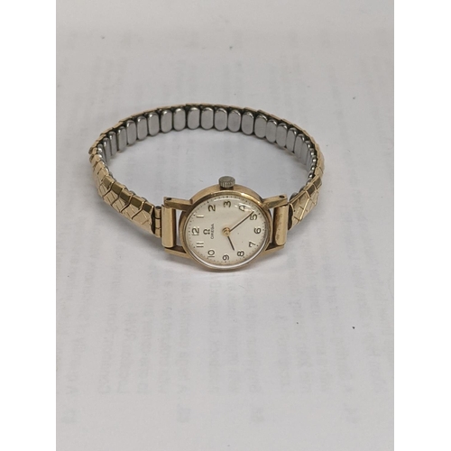 39 - A ladies Omega manual wind 9ct gold wristwatch and a later expanding bracelet
Location: CAB2