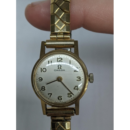 39 - A ladies Omega manual wind 9ct gold wristwatch and a later expanding bracelet
Location: CAB2