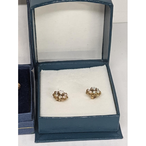 42 - A mixed lot of jewellery to include a pair of 9ct gold earrings inset with diamonds and ruby, and ot... 