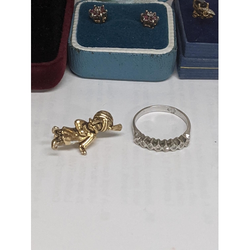 42 - A mixed lot of jewellery to include a pair of 9ct gold earrings inset with diamonds and ruby, and ot... 