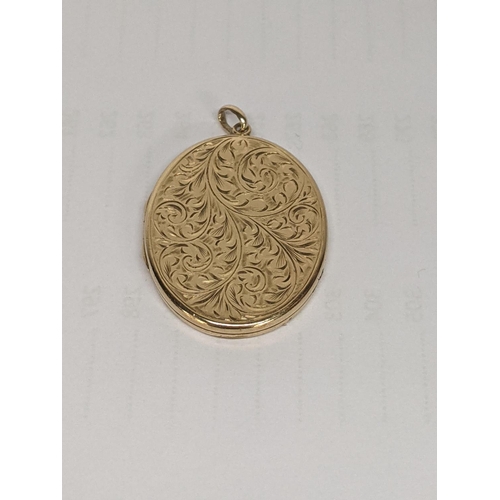 43 - A 9ct gold floral engraved locket pendant, total weight 12.4g
Location: CAB2