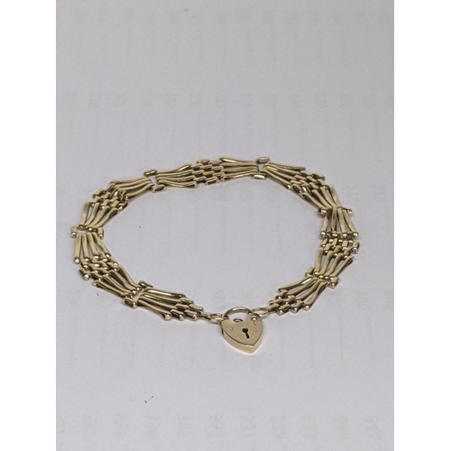 46 - A 9ct gold gate link bracelet with hear shaped clasp, total weight 7.5g
Location: CAB4