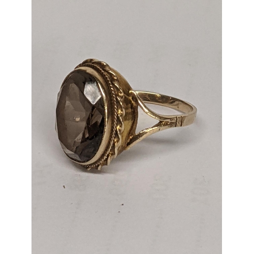 52 - A 9ct gold six stone ring together with a 9ct gold citrine
Location: CAB4