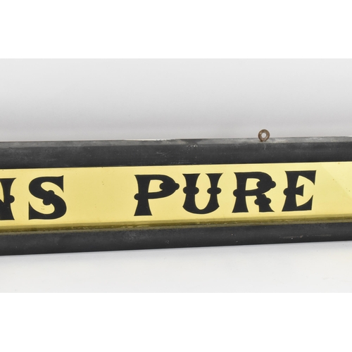 267 - A vintage glazed advertising sign for 'Eastmans pure tea',  with black lettering on gilt ground, in ... 