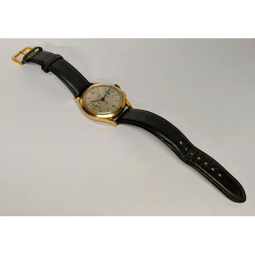 85 - A mid 20th century 18ct gold, chronograph manual wind, gents wristwatch, having a silvered dial with... 
