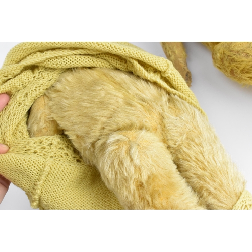 271 - A collection of vintage teddy bears, to include a blonde haired Dean's bear, a large Chiltern bear w... 