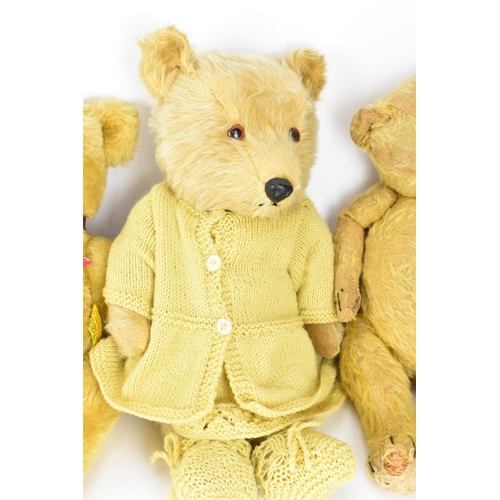 271 - A collection of vintage teddy bears, to include a blonde haired Dean's bear, a large Chiltern bear w... 