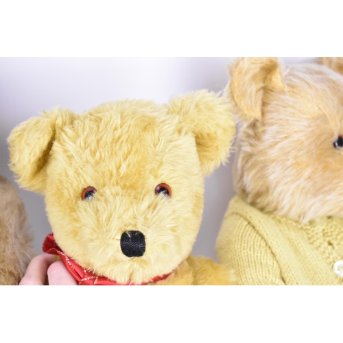 271 - A collection of vintage teddy bears, to include a blonde haired Dean's bear, a large Chiltern bear w... 
