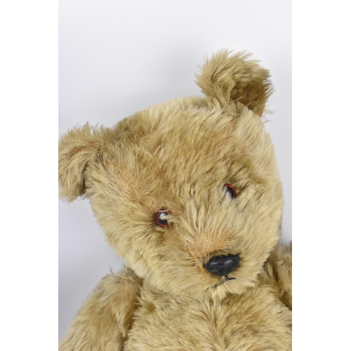271 - A collection of vintage teddy bears, to include a blonde haired Dean's bear, a large Chiltern bear w... 