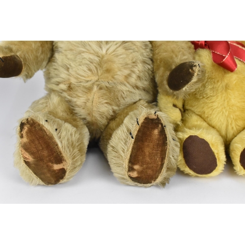 271 - A collection of vintage teddy bears, to include a blonde haired Dean's bear, a large Chiltern bear w... 