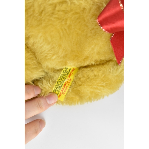 271 - A collection of vintage teddy bears, to include a blonde haired Dean's bear, a large Chiltern bear w... 