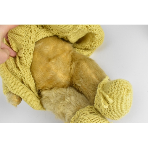 271 - A collection of vintage teddy bears, to include a blonde haired Dean's bear, a large Chiltern bear w... 