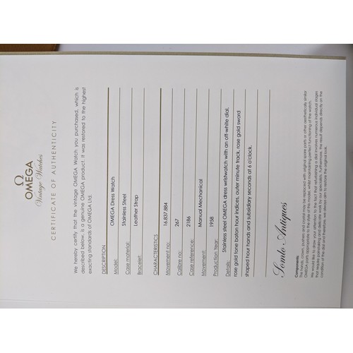 89 - A Omega manual wind gents wristwatch, circa 1958, having a white enamel dial with gilt applied hour ... 