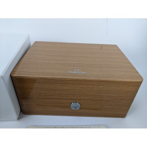 89 - A Omega manual wind gents wristwatch, circa 1958, having a white enamel dial with gilt applied hour ... 