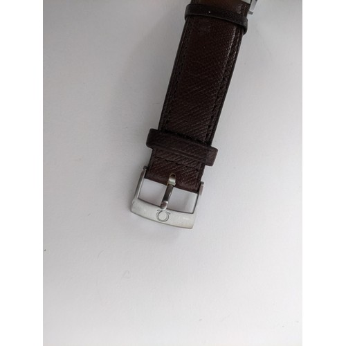 89 - A Omega manual wind gents wristwatch, circa 1958, having a white enamel dial with gilt applied hour ... 