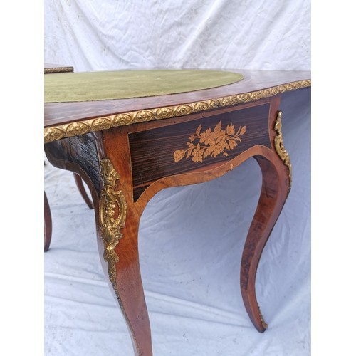 112 - A pair of 20th century walnut and marquetry card tables, the folded tops with eared corners mounted ... 