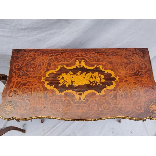 112 - A pair of 20th century walnut and marquetry card tables, the folded tops with eared corners mounted ... 