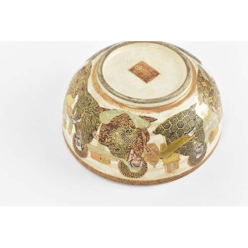 10 - A Japanese Satsuma porcelain bowl, Meiji period (1864-1911), of circular form depicting Buddhist imm... 