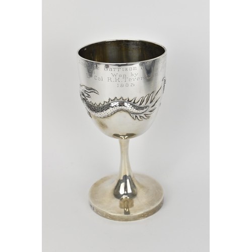 13 - An Edwardian Chinese export silver golf trophy cup by Wang Hing & Co, the body with embossed three-c... 