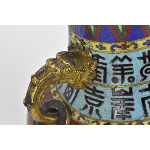 19 - A Chinese cloisonne archaic style 'flower' baluster vase, early 20th century, with twin brass mask h... 