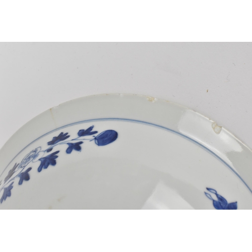 2 - A Chinese Qing dynasty blue and white porcelain bowl, 18th century, with butterfly and melon design ... 