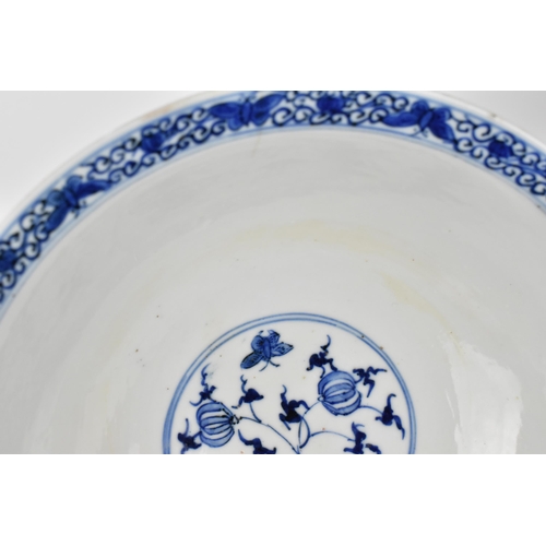 2 - A Chinese Qing dynasty blue and white porcelain bowl, 18th century, with butterfly and melon design ... 