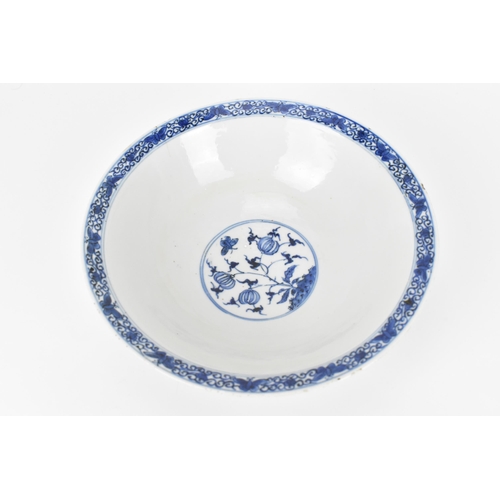 2 - A Chinese Qing dynasty blue and white porcelain bowl, 18th century, with butterfly and melon design ... 