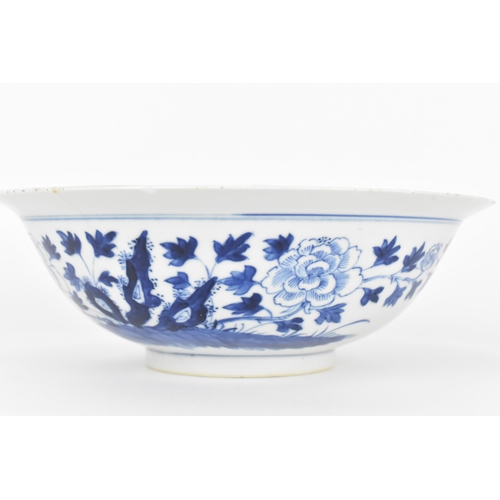 2 - A Chinese Qing dynasty blue and white porcelain bowl, 18th century, with butterfly and melon design ... 