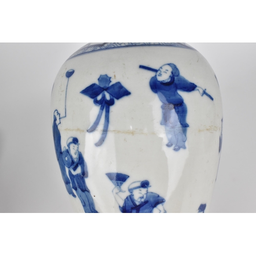 22 - A Chinese Qing dynasty blue and white baluster vase, 19th century, with various figures on a white g... 