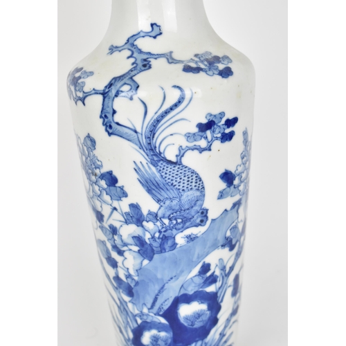 31 - A Chinese late Qing dynasty blue and white porcelain vase, 19th century, of tapered form with centra... 