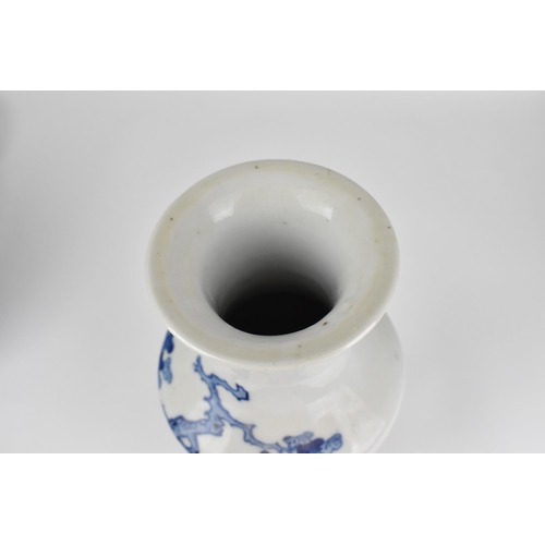 31 - A Chinese late Qing dynasty blue and white porcelain vase, 19th century, of tapered form with centra... 