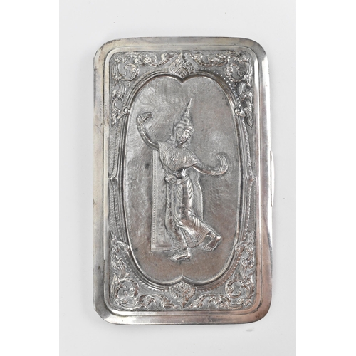 35 - An Indian white metal card case, of rectangular form with central dancing deity to the front on a te... 