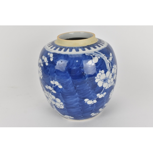 36 - A Chinese late Qing dynasty blue and white lidded ginger jar, late 19th century, of typical ovoid fo... 