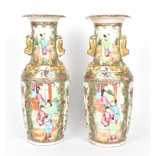 39 - A pair of Chinese export Famille Rose porcelain vases, 19th century, Canton, of baluster form with g... 