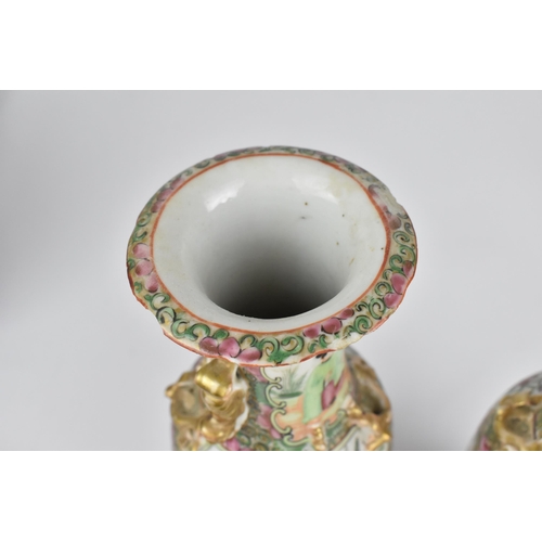 39 - A pair of Chinese export Famille Rose porcelain vases, 19th century, Canton, of baluster form with g... 