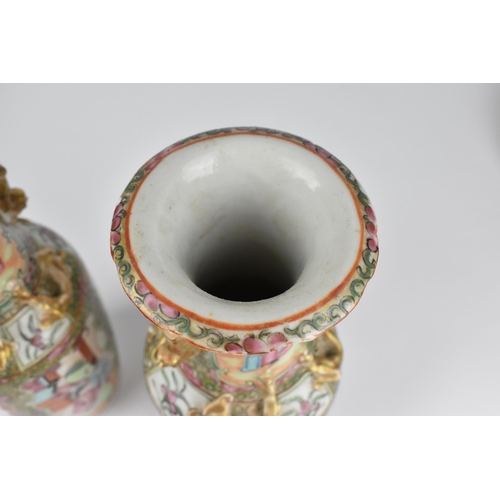 39 - A pair of Chinese export Famille Rose porcelain vases, 19th century, Canton, of baluster form with g... 