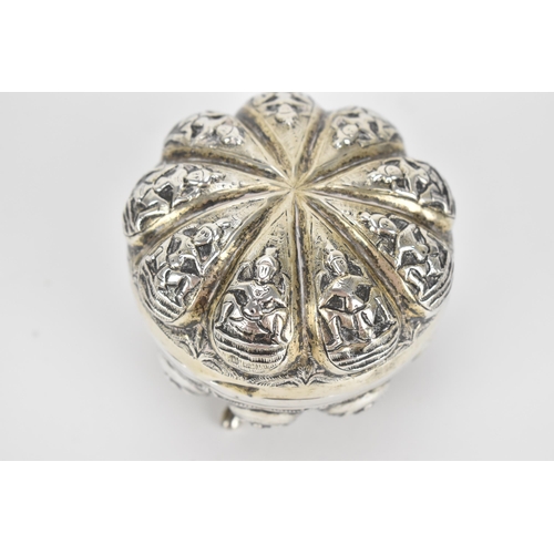 44 - An Indian colonial Swami white metal lidded pot, circa 1890/1900, Madras, of circular form with embo... 