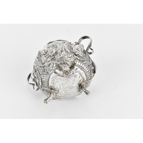 45 - An Indian colonial white metal twin-handled pot, possibly Bombay, circa 1890/1900, with deep embosse... 