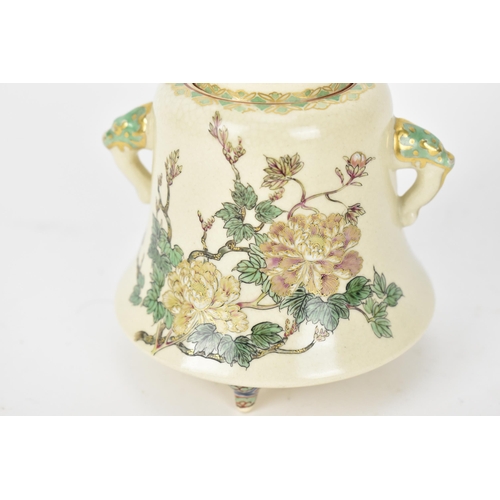 52 - A Japanese late Meiji period koro or hibachi, of bell shape with painted detailed peonies embellishe... 