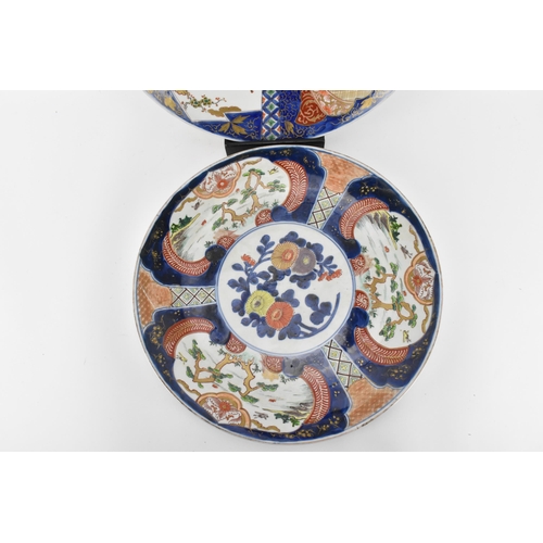 57 - Two Japanese arita porcelain chargers, late Meiji period, with enamelled outdoor vignettes with gilt... 