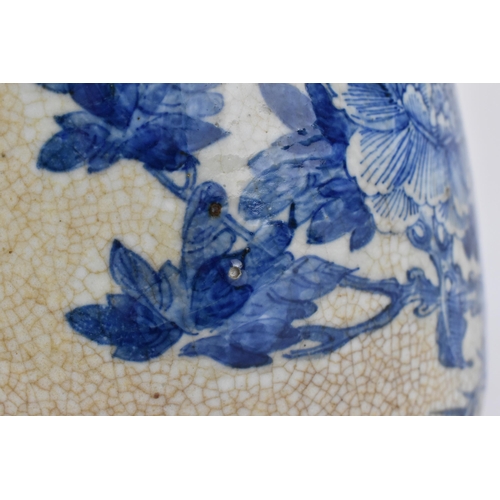 58 - A 19th century Chinese blue and white baluster vase, with crackled glaze and bronze effect banding, ... 