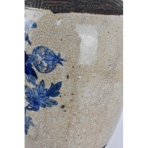 58 - A 19th century Chinese blue and white baluster vase, with crackled glaze and bronze effect banding, ... 