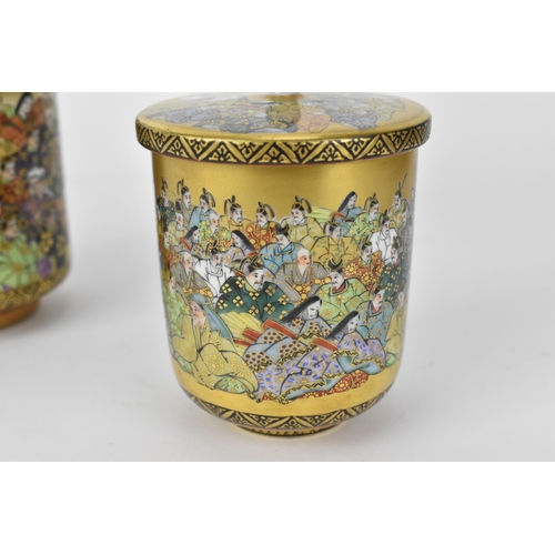 59 - A set of Japanese kutani wedding ceremonial tea cups, Meiji/Taisho period, intricately decorated wit... 