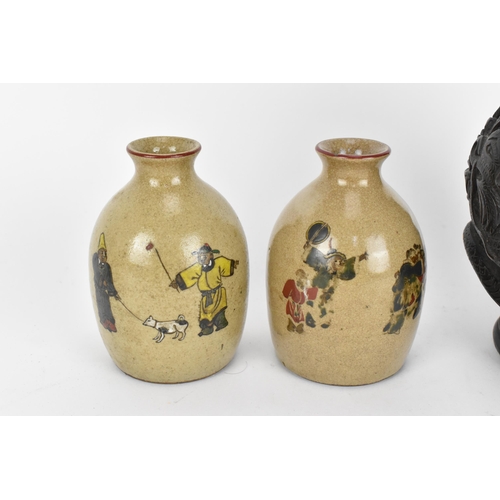 65 - A small collection of Chinese ceramics, comprising a pair of crackle glazed bottle vases with figura... 