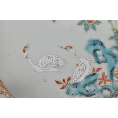 7 - Two Chinese Qianlong period Famille Rose porcelain dishes, 18th century, one oval dish with two bird... 