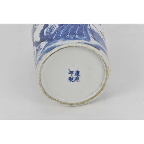 8 - A Chinese Qing dynasty blue and white porcelain vase, late 19th century, of tapered form with peacoc... 