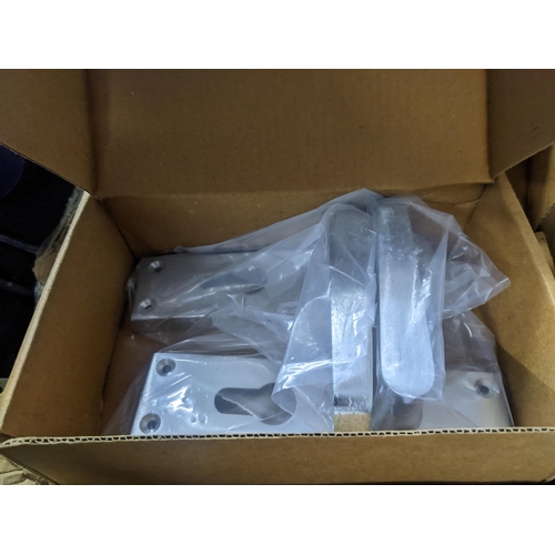 106 - A box of brass door handles with back plates, some with lock others missing, latches and a letter bo... 