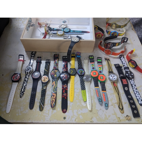 112 - A collection of approximately 29 Swatch watches Location:A2B