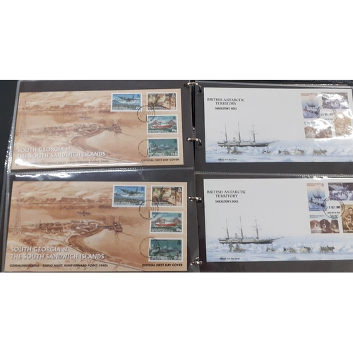 136 - A quantity of First Day covers, 1980's and 1990's, housed in a green folder together with a small qu... 